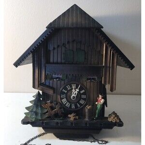 Swiss German Woodcutter's Chalet The Wood Cutter Boy Cuckoo Clock